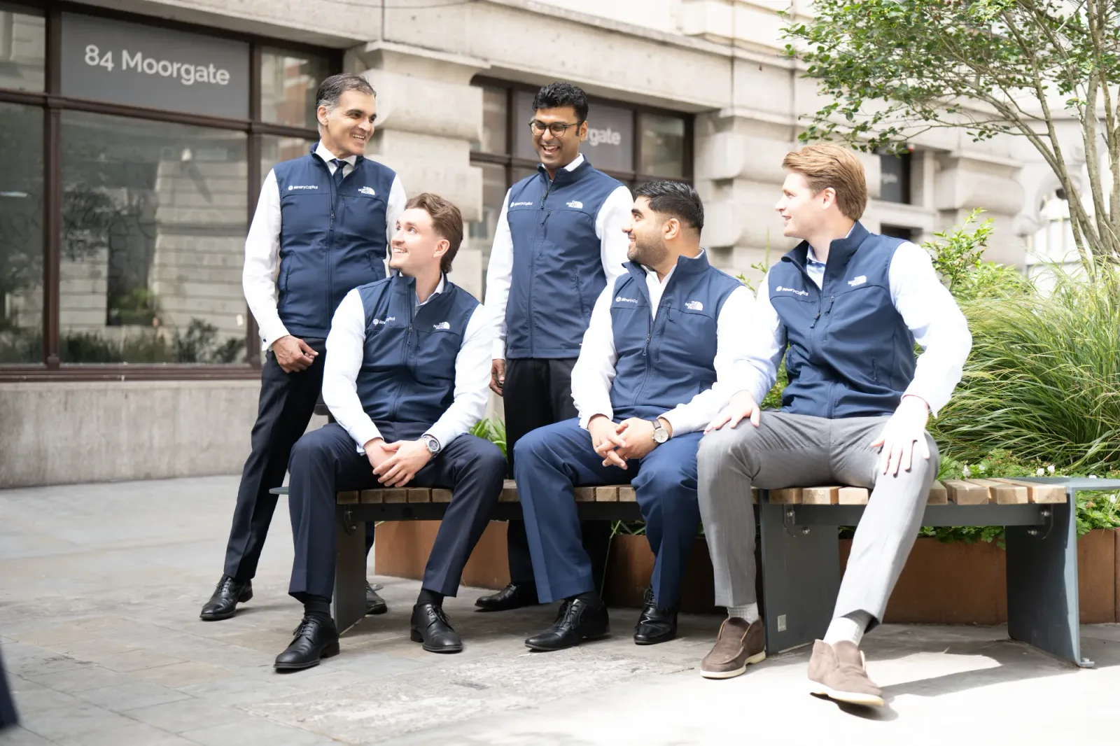 Binary Capital analysts reviewing investment data